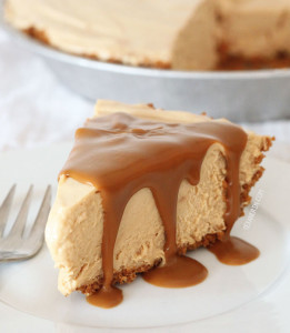 slice of biscoff pie with melted biscoff on top on a white plate