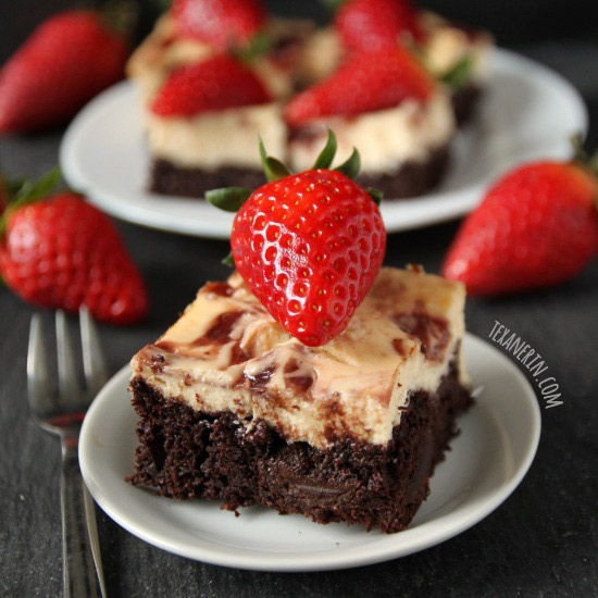 These fudgy strawberry cheesecake brownies are made healthier with Greek yogurt and 100% whole grains!