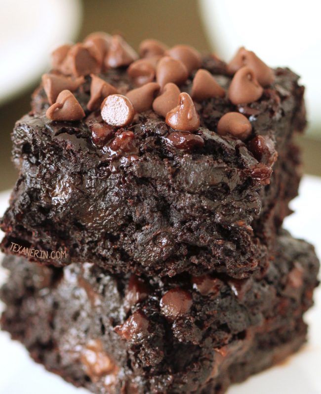 Chocolate Zucchini Brownies - 100% whole grain (can also be made with all-purpose flour), dairy-free, and have no added fat other than what is in the chocolate chips! So gooey and chocolatey, nobody will have a clue that these are made healthier