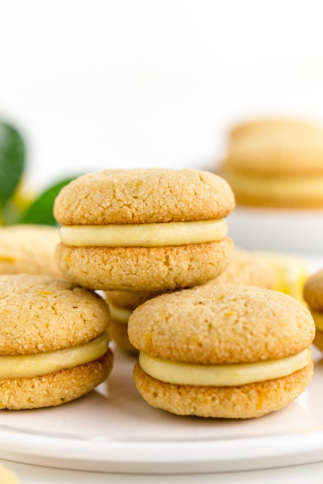 Lemon curd is sandwiched between soft and chewy paleo lemon cookies in this dairy-free treat!