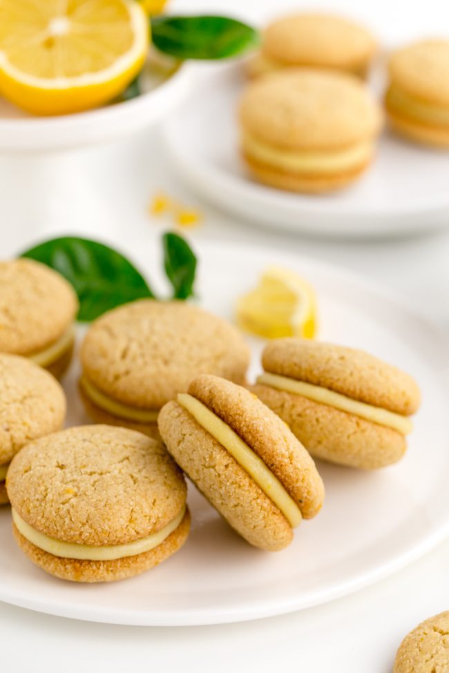 Lemon curd is sandwiched between soft and chewy paleo lemon cookies in this dairy-free treat!