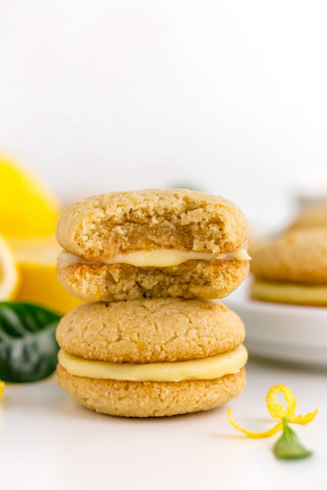 Lemon curd is sandwiched between soft and chewy paleo lemon cookies in this dairy-free treat!