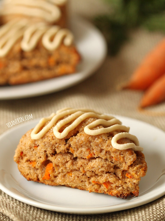 These healthier carrot cake scones are made with whole grains, less sugar and maple sweetened cream cheese frosting!