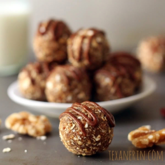 These raw cinnamon raisin cookie dough balls are sweetened with dates and raisins and are completely guilt free! Just process in a food processor and roll into balls.