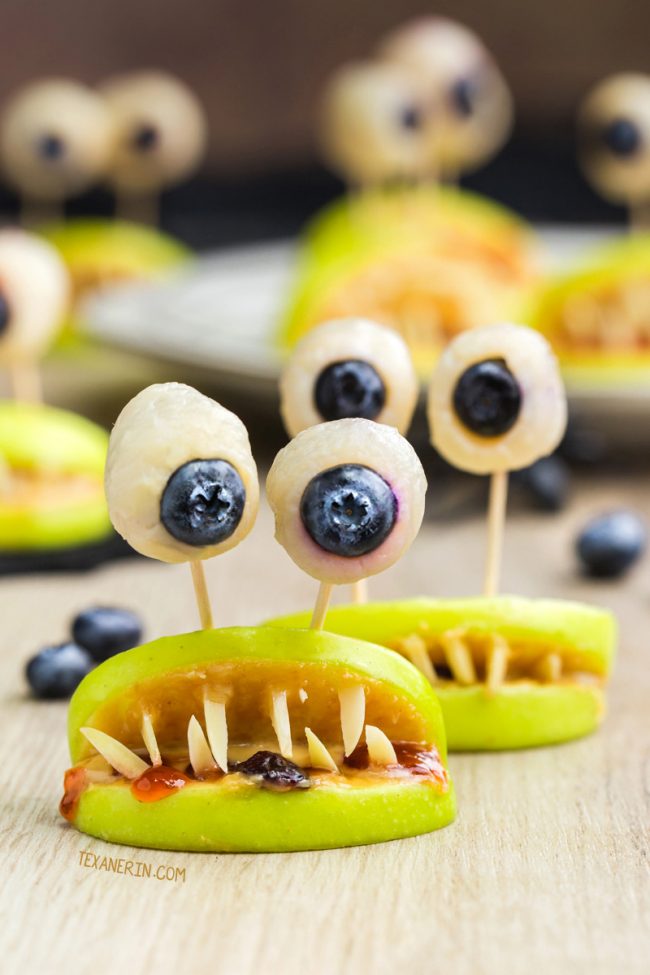 These monster mouths are perfect healthy Halloween treats and just use apples, strawberry jam, nut or seed butter, and almonds / sunflower seeds. Naturally paleo, vegan, nut-free, grain-free, gluten-free and dairy-free.