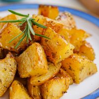 greek potatoes on plate close-up