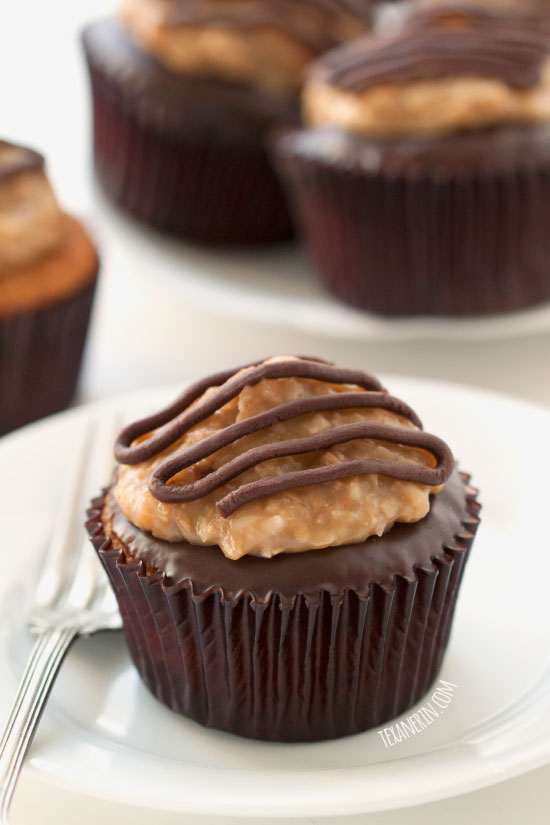 These grain-free and gluten-free Samoa cupcakes feature a coconut flour and brown sugar based cupcake and homemade coconut caramel topping!