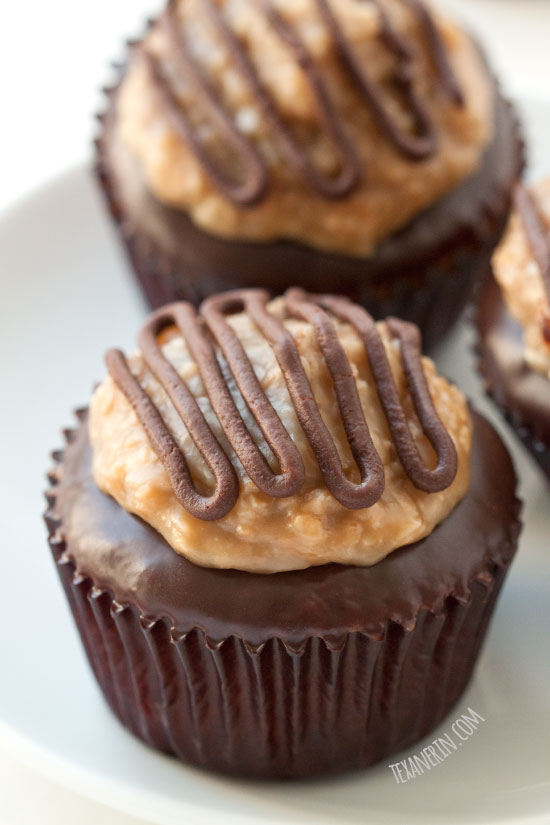 These grain-free and gluten-free Samoa cupcakes feature a coconut flour based brown sugar cupcake and homemade coconut caramel topping!