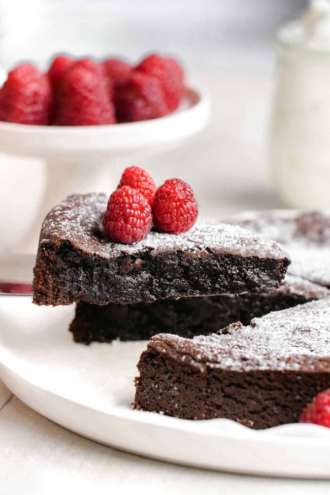 This kladdkaka, also known as Swedish chocolate sticky cake, is amazingly gooey, delicious and only calls for 8 simple ingredients. This recipe includes a traditional option as well as a gluten-free, dairy-free and vegan version.