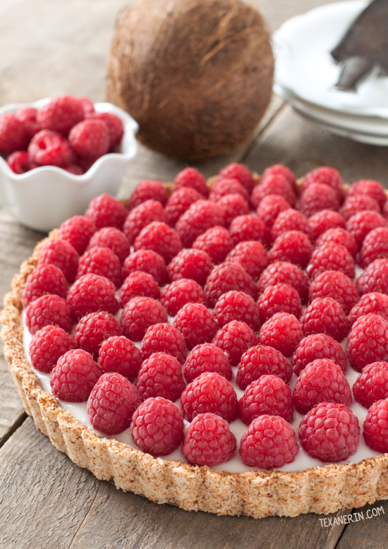 This raspberry coconut tart has a simple press-in coconut crust and coconut pudding filling! {vegan, gluten-free, and dairy-free}