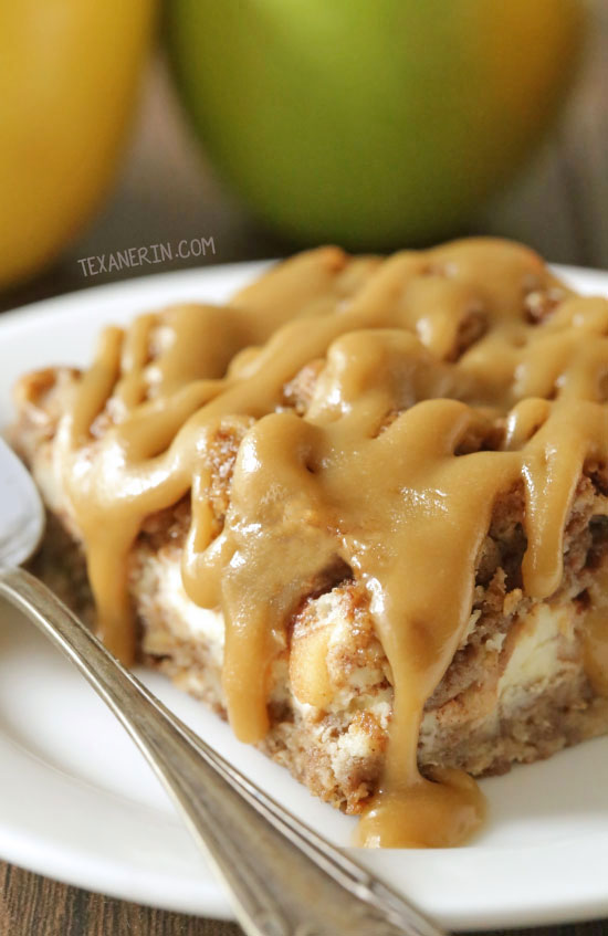 These healthier caramel apple cheesecake bars feature an oatmeal cookie-like crust and topping with a simple and delicious caramel glaze! They're oat-based making them gluten-free and 100% whole grain.