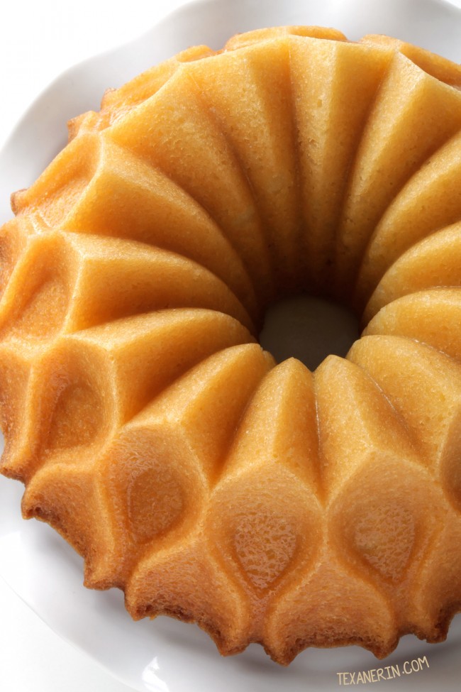 Coconut Rum Cake drenched in coconut rum syrup - can be made with all-purpose, gluten-free or whole grain flour. With a dairy-free option (please click through to the recipe to see the dietary-friendly options). #nordicware70