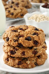oatmeal cookies stacked on a white plate