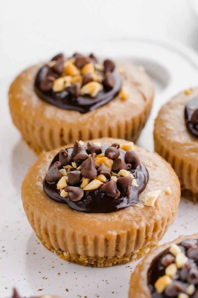 These vegan no-bake peanut butter pies are made healthier with the help of bananas, coconut milk and maple syrup. With a paleo option.