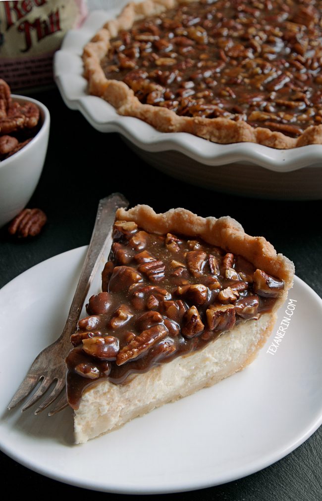 This caramel pecan cheesecake pie has a layer of caramel pecans over a cream cheese filling. With gluten-free, whole grain and all-purpose flour options. Perfect for Christmas and  Thanksgiving!