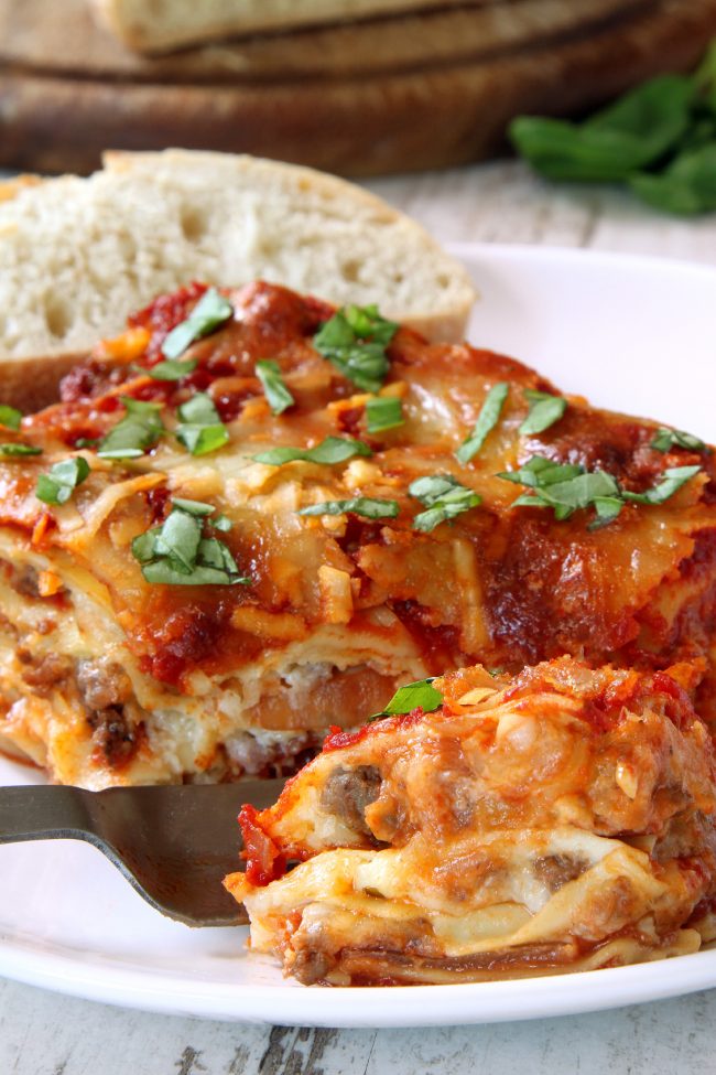 This classic homemade lasagna has homemade red wine sauce, a super creamy cheese filling and can be made gluten-free or whole wheat or with regular noodles.