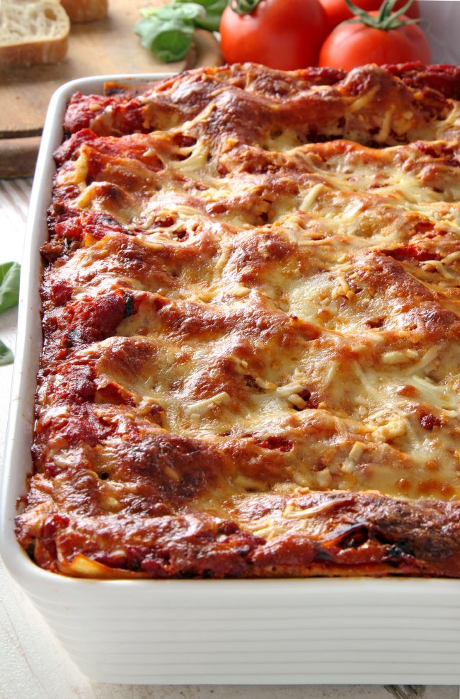 This classic homemade lasagna has homemade red wine sauce, an amazingly creamy cheese filling and can be made with gluten-free, whole wheat or regular noodles.