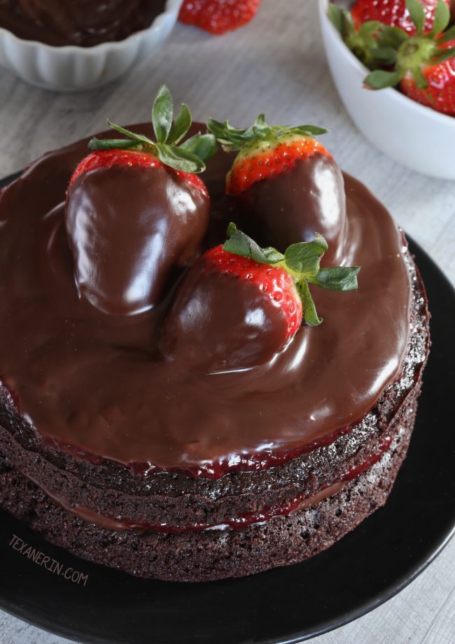 This moist paleo chocolate strawberry cake has a great texture, chocolate fudge frosting and strawberry filling. With whole wheat and all-purpose flour options!