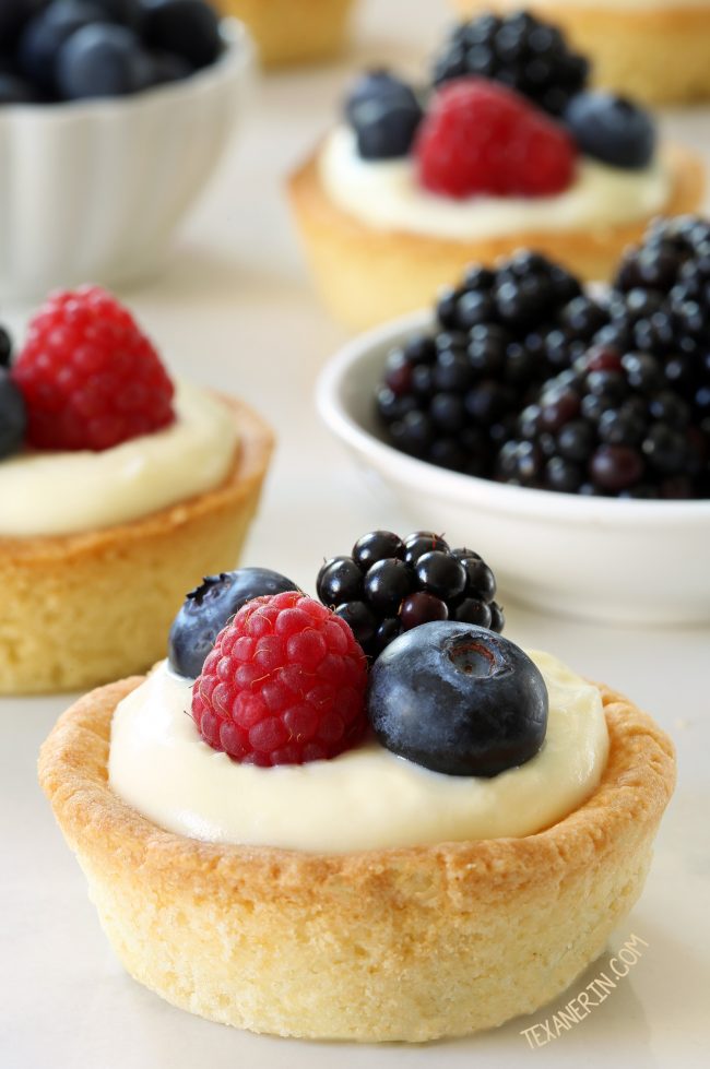 These cheesecake cookie cups have a sugar cookie crust and a delicious white chocolate cream cheese filling. Can be made with gluten-free, whole wheat or all-purpose flour.