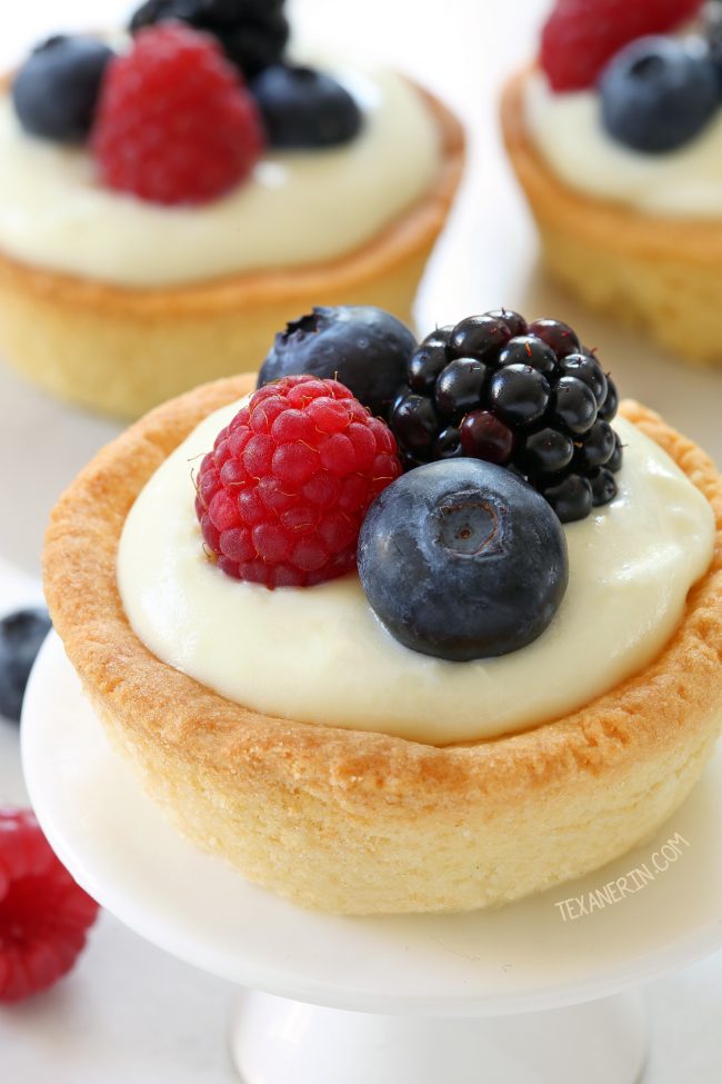These cheesecake cookie cups have a sugar cookie crust and a delicious white chocolate cream cheese filling. Can be made with gluten-free, whole wheat or all-purpose flours.