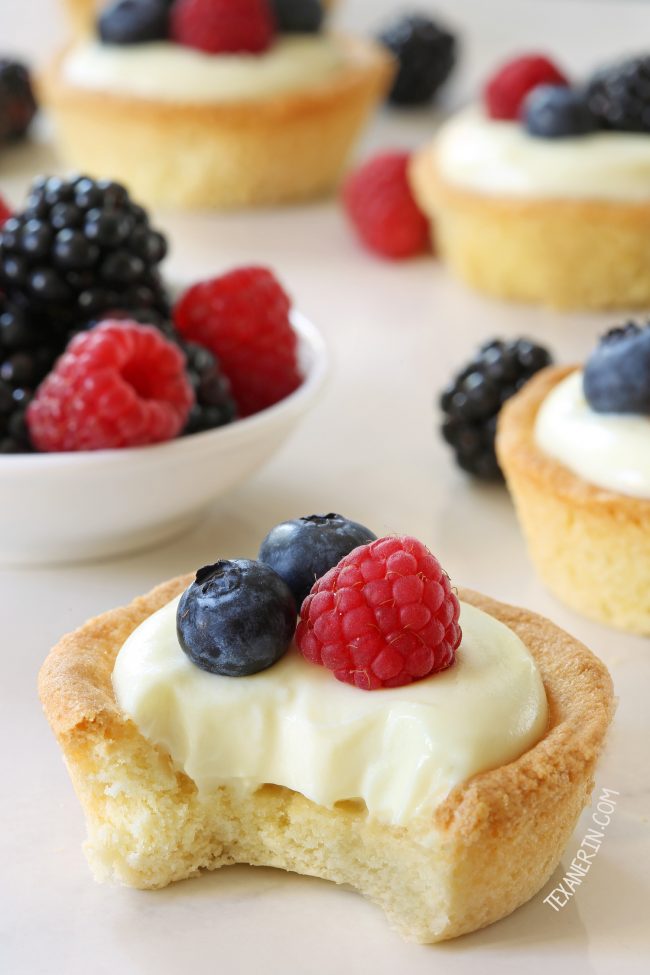 These cheesecake cookie cups have a sugar cookie crust and a delicious white chocolate cream cheese filling. Can be made with gluten-free, whole wheat and all-purpose flour.