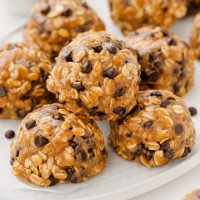 plate of vegan no-bake cookies with chocolate chips