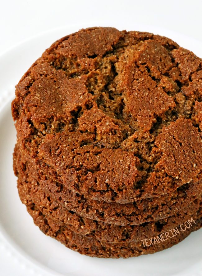 Paleo gingerbread cookies that have crisp edges and chewy centers! With a vegan option. Easy to make and no rolling out required.