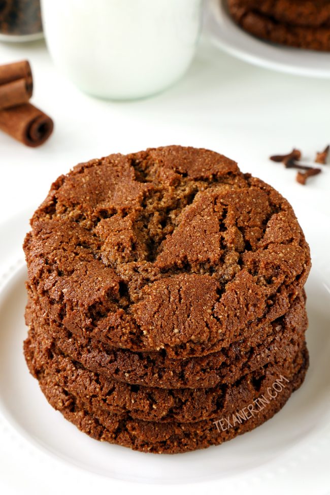 Paleo gingerbread cookies that have crisp edges and chewy centers! With a vegan option. Easy to make and no rolling out required.