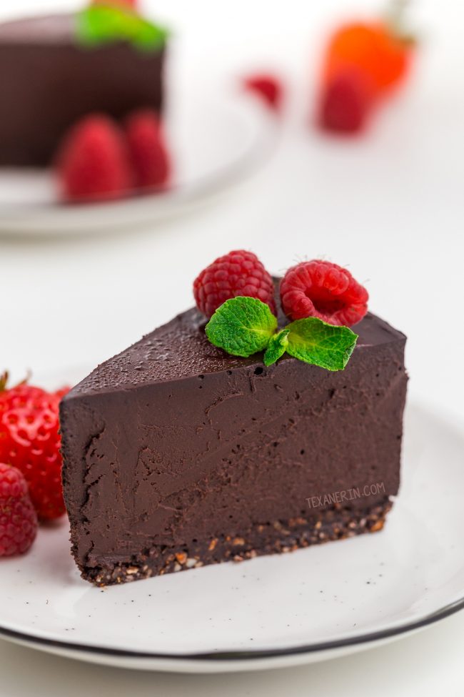 This easy paleo chocolate cheesecake is also vegan and super rich, creamy and decadent! Made with coconut milk, dates and coconut sugar, this no-bake cheesecake is a little healthier than your traditional cheesecake.
