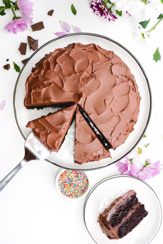 This amazingly delicious vegan chocolate cake is fudgy, super moist, chocolaty and is topped off with an easy whipped chocolate ganache frosting! Can be made gluten-free, whole wheat or with all-purpose flour. Tastes just like a regular chocolate cake!