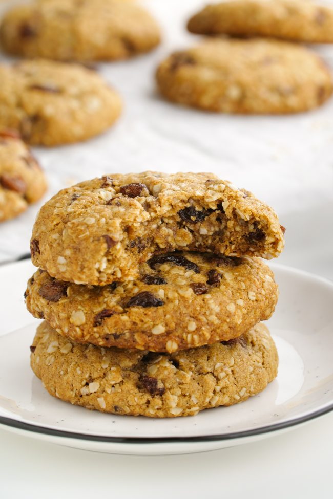 These vegan oatmeal cookies are crisp on the outside and chewy on the inside and taste just like traditional oatmeal raisin cookies! Can be made gluten-free, whole wheat or with all-purpose flours.