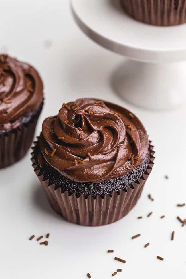 These gluten-free chocolate cupcakes are incredibly moist and just as delicious as traditional cupcakes! With dairy-free and vegan options.