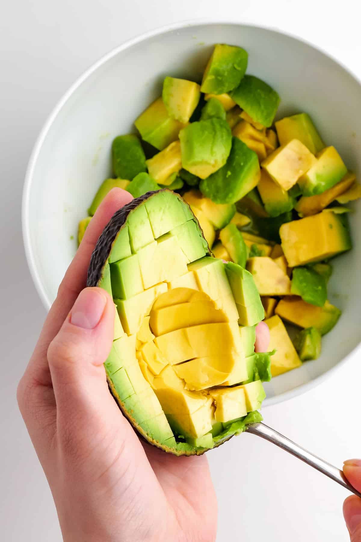 How to Cut Avocados. The Ultimate Avocado Guide - from how to pick an avocado, how to cut avocados, how to store avocados and how to use avocados.