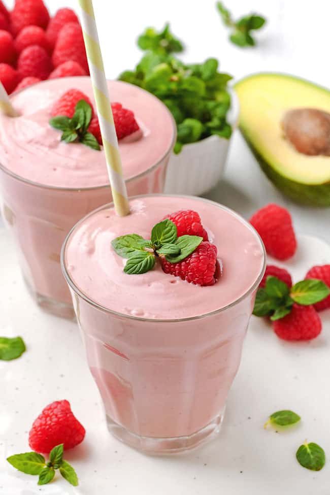 This raspberry smoothie is super thick thanks to bananas, avocado and yogurt and can also be made paleo and vegan by simply using coconut milk yogurt.