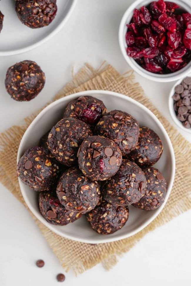 These bliss balls are loaded with chocolate, are no-bake and easy to make gluten-free and vegan. They only take 6 ingredients and 5 minutes to make! Your family is going to love these chocolate bliss balls.