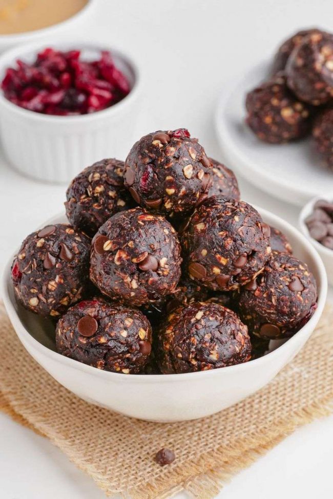 These bliss balls are loaded with chocolate, are no-bake and easy to make gluten-free and vegan. They only take 6 ingredients and 5 minutes to make! Your family is going to love these chocolate bliss balls.