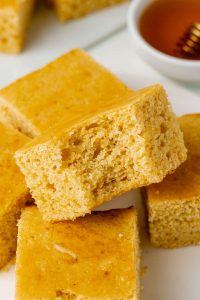 dairy-free cornbread slice on white plate