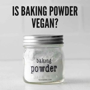 pin image of a small jar of baking powder with a text saying is baking powder vegan