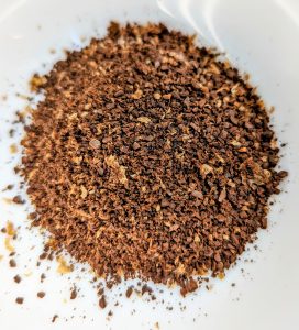 medium-coarse ground coffee beans in a bowl