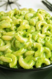 close-up of halloween mac and cheese in a black dish