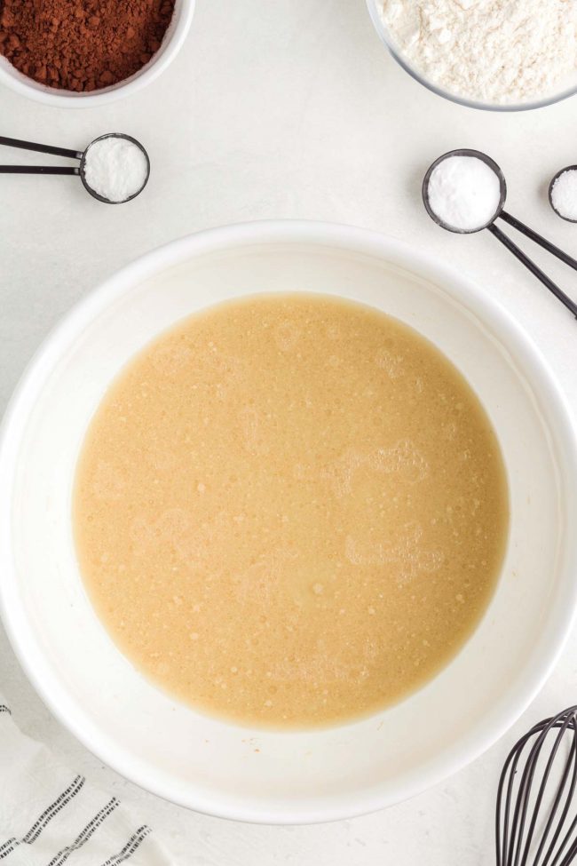 Liquid ingredients mixed together in a mixing bowl