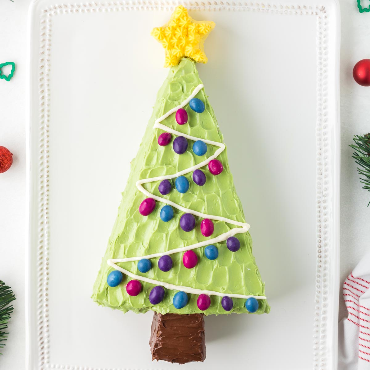 https://www.texanerin.com/content/uploads/2022/11/Christmas-Tree-Cake-image-1200.jpg