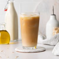 image showing a tall glass of creamy Oleato iced shaken espresso