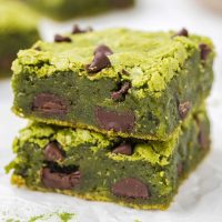 image of two vivid green match brownies with chocolate chips stacked on each other