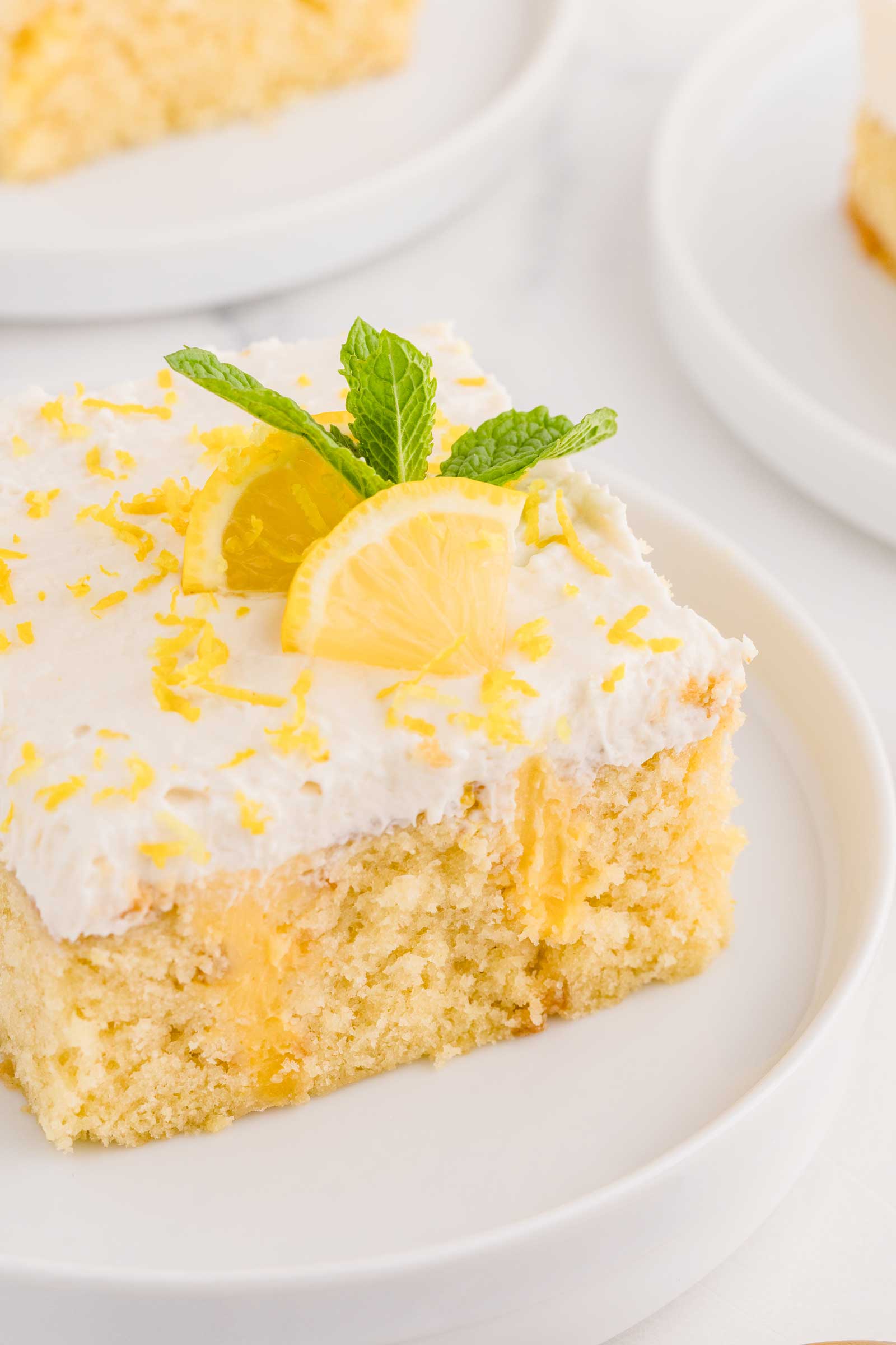 close-up of lemon cake on white plate