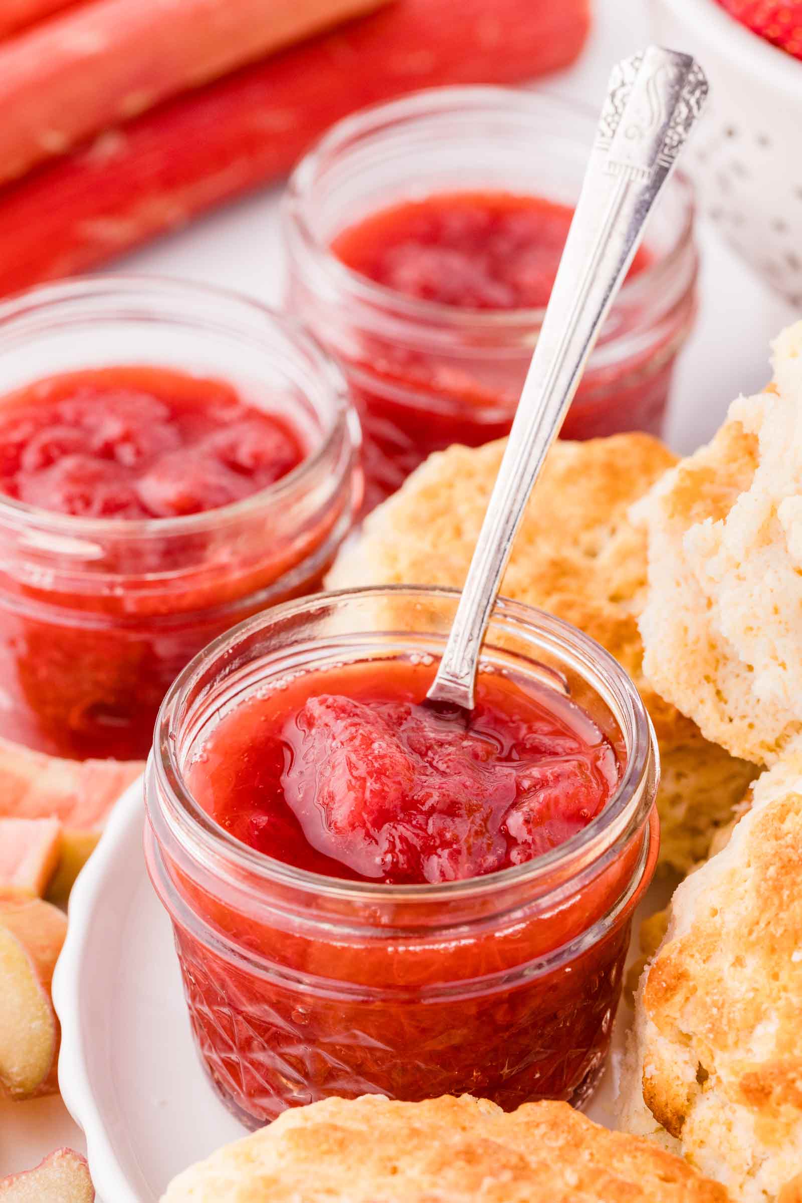 preserves in a glass jar with a spoon