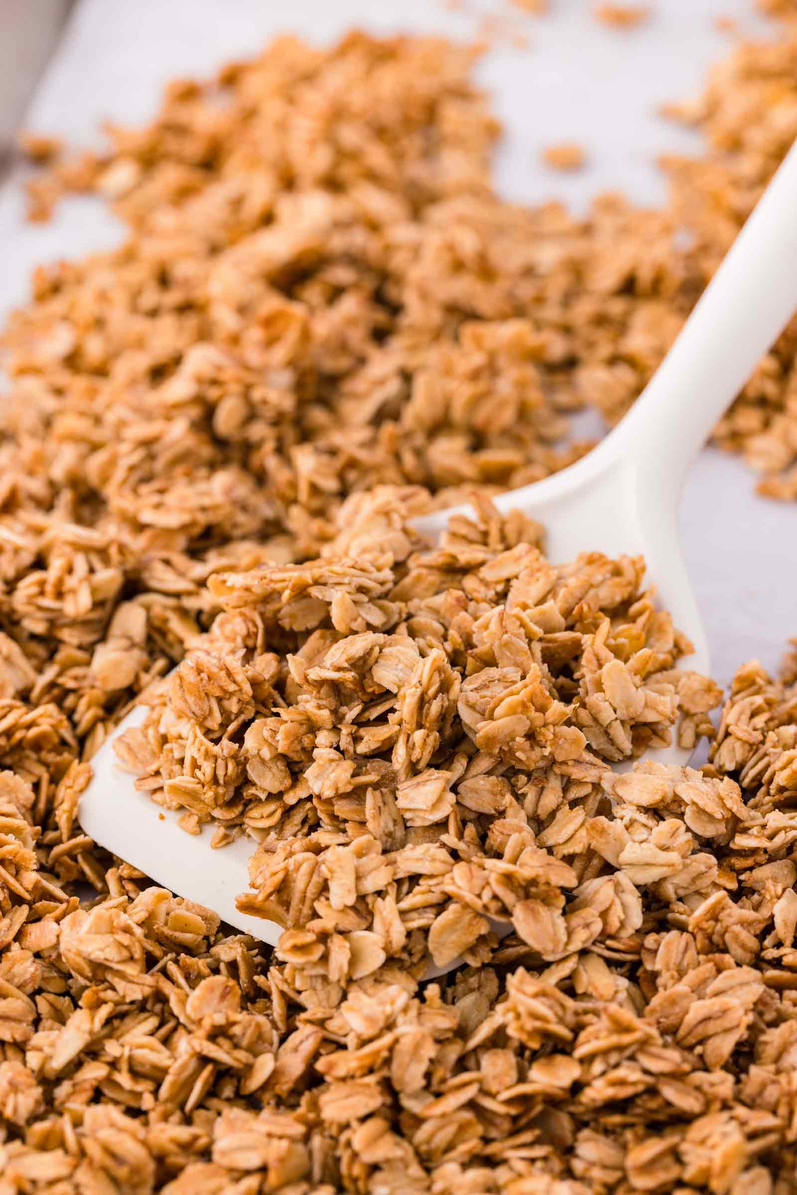 spatula digging into granola