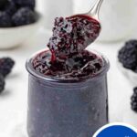 pin image for blackberry jam showing it on a white table with a text saying small-batch and without pectin