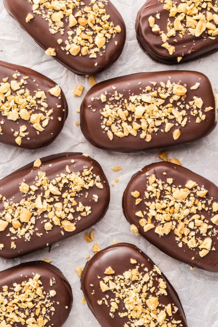 several protein ice cream bars on a white piece of parchment paper