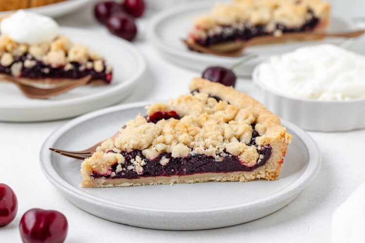 slice of cherry tart on a white plate